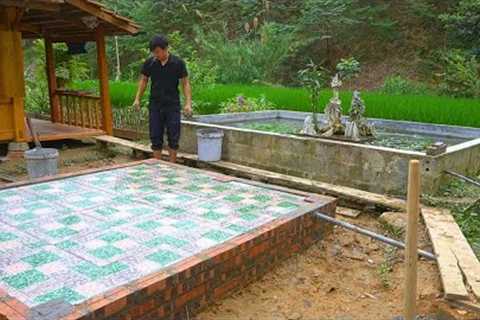 Completing the construction of a clean bathroom - Lay out clean flower tiles