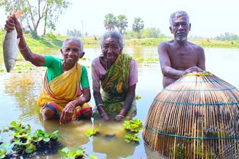 Santali old Grandfather &amp; Grandmother catching fish from pond and cooking | tribal fishing..
