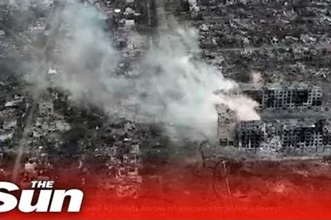 Drone footage shows massive explosions as smoke rising over Bakhmut