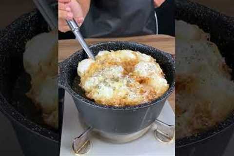 Add eggs to boiling oil! Why wasn't I told this recipe before?