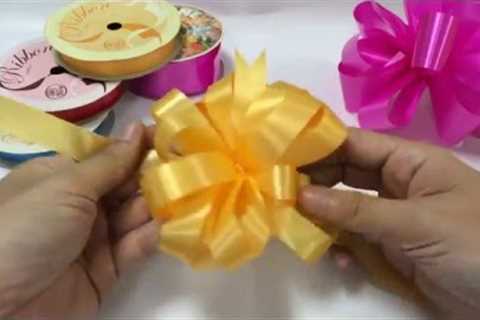 HOW TO MAKE AN EASY GIFT RIBBON BOW STEP BY STEP POMPOM POM POM PON MUST WATCH