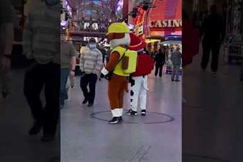 Las Vegas Strip street performer hustler hustles showgirls photo tips shakedown busker Fremont st