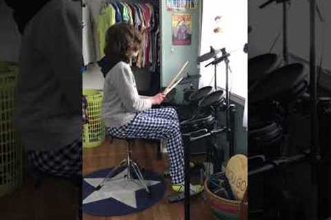 One month into teaching himself to play the (electronic) drums!