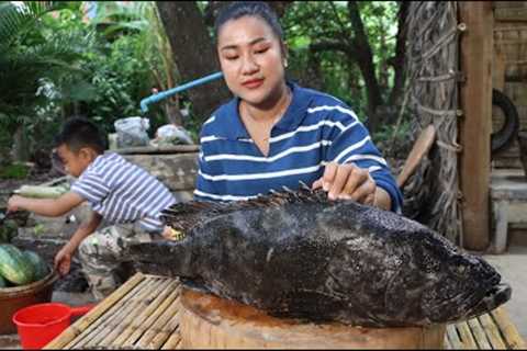 Mom and children cook big ocean fish eat with Cambodia noodle - Cook and eat