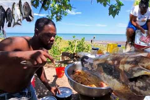 enjoying life in Jamaica on the beach catching fish cooking wild hog head and beef