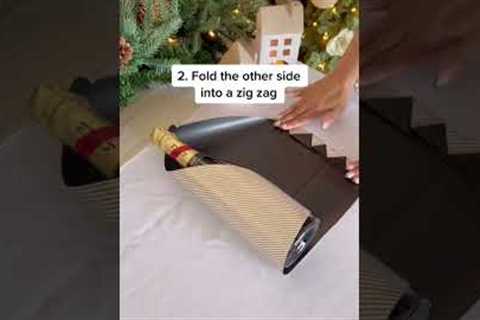 The easy way to wrap your wine bottles 🎁 #shorts #christmas #christmas2022 #giftwrapping