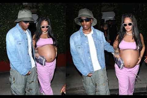 Rihanna and ASAP Rocky hold each other tight as they exit from Giorgio Baldi!