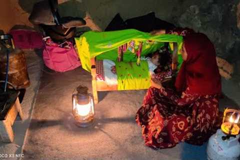 Moving household items from the tent to the newly built hut by a lonely nomadic woman with baby