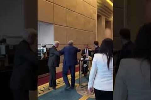 A Ukrainian delegate punched a Russian delegate after he grabbed the #Ukraine flag at a summit