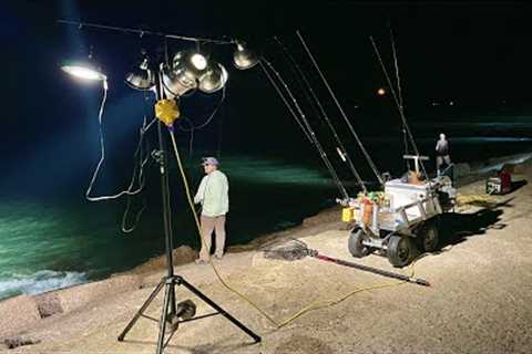 This mile long jetty was lit up with spotlights for hot fishing action