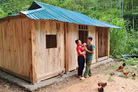 Building a wooden house with his wife - wooden plank construction, farm life