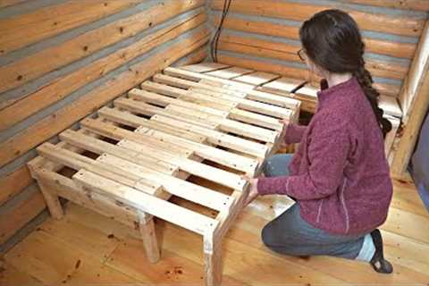 Building A Log Cabin | Ep. 64 | Winter is here! Building a seating nook with a pull-out guest bed