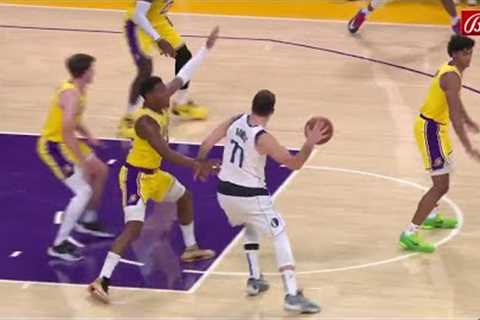 Luka Doncic makes a ridiculous NUTMEG pass through LeBron's legs!
