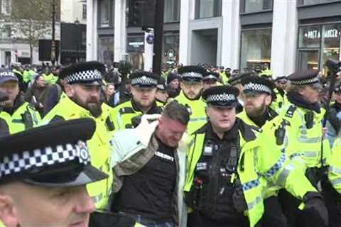 EDL founder Tommy Robinson arrested at anti-Semitism march in London | AFP