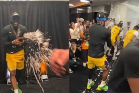 LeBron James spraying champagne in Lakers locker room after winning in-season tournament