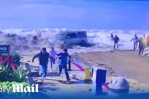 Moment huge waves batter the coast of California