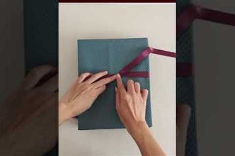 How to tie a ribbon bow on gift box