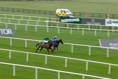 READIN TOMMY WRONG fends off ILE ATLANTIQUE to win the Lawlor's Of Naas Novice Hurdle