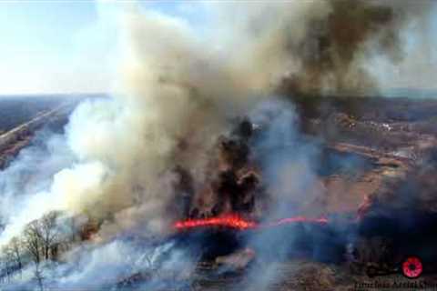 Ogden Dunes Preforming A Controlled Burn Of Marsh 4K Drone Footage