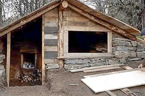 Build a survival shelter with a cozy fireplace inside the wild l Life in the forest