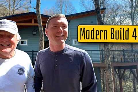 Modern Home Build | 48 of 50 | metal siding install, screening between beams, 300lb wall oven