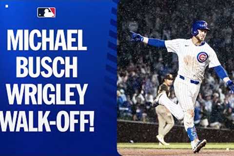 Michael Busch hits a WALK-OFF home run for the Cubs in the pouring rain!