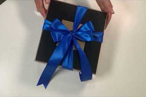 Gift Wrapping - How to make a double bow on the box