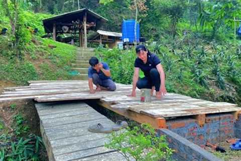 The process of building the second wooden bridge. Ensuring safety before the rainy season