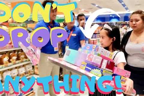 I'LL BUY WHATEVER YOU CAN CARRY CHALLENGE! (TOY STORE EDITION!) | YESHA C.