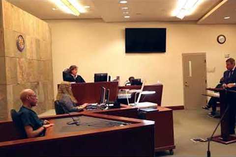 Inmate spars with defense attorney