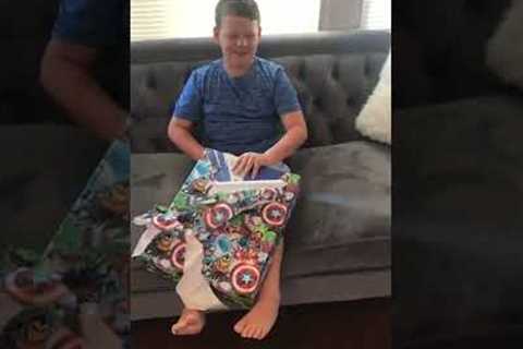 Kid unboxing ps4 for the first time