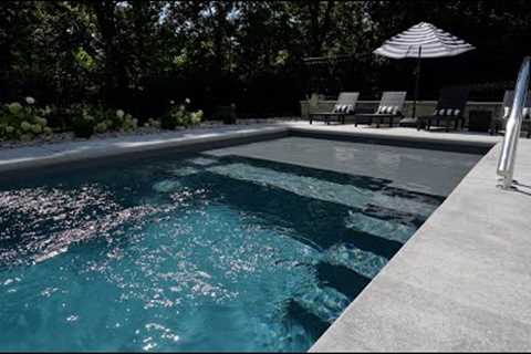 Fiberglass pool installation with concrete patio and retaining wall. Start to finish.