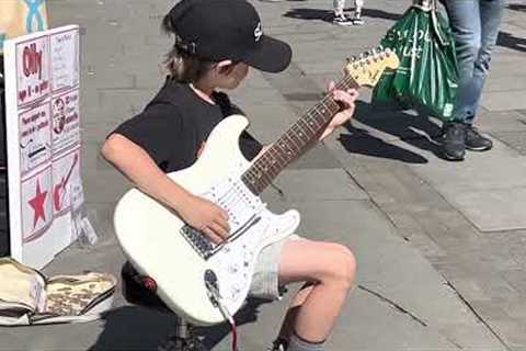 Apache / 8 year old Olly busking guitar / Chester / gaining confidence / getting fans