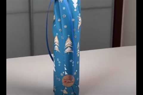 Gift wrap a bottle of wine//gift wrapping ideas #wrappingabottle#giftwrappingtutorial