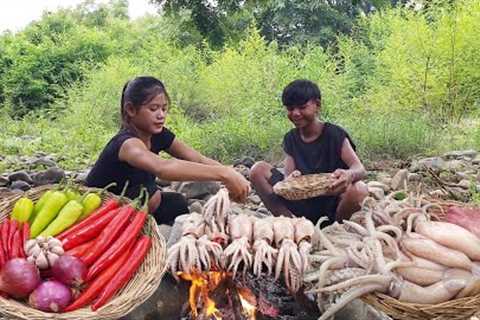 Squid pork spicy grilled on the rock for dinner - Survival cooking in forest