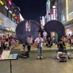 Awesome chinese street singer!