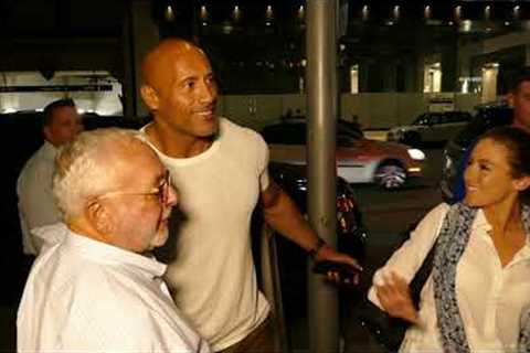 THE ROCK DWAYNE JOHNSON GREETS FANS OUTSIDE OF A RESTAURANT IN BEVERLY HILLS CALIFORNIA