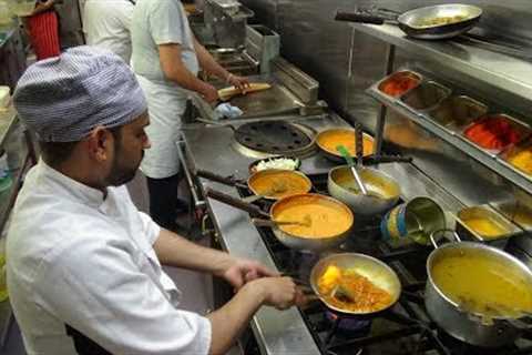 The Heat of the Curry Master's Kitchen on a Busy Friday Night at Shambhala Village Indian Restaurant