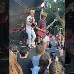 Can't believe this happened! 🤯 10 year old asks band at festival to let him play guitar..