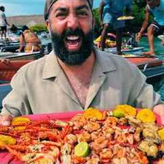 Fresh Lobster and Oysters Delivered to Your Boat While Island Hopping in Cartagena