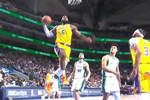 LeBron James just having fun doing dunk contest dunks after the whistle