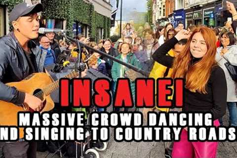 MASSIVE CROWD Singing and Dancing to COUNTRY ROADS!​