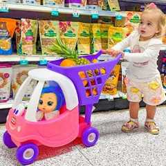 Alice and Baby doll doing shopping in the supermarket