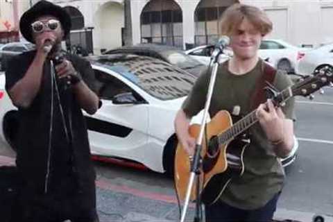 will.i.am surprises street performer @Levimitchell