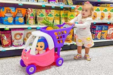Alice and Baby doll doing shopping in the supermarket
