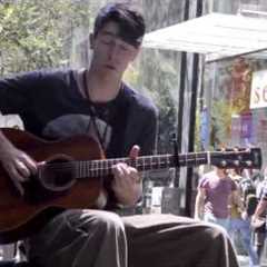 Epic Guitar Player. Awesome Street Performer