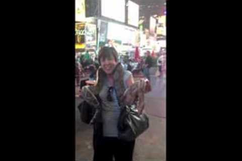 My Nana with a snake in Times Square, NYC