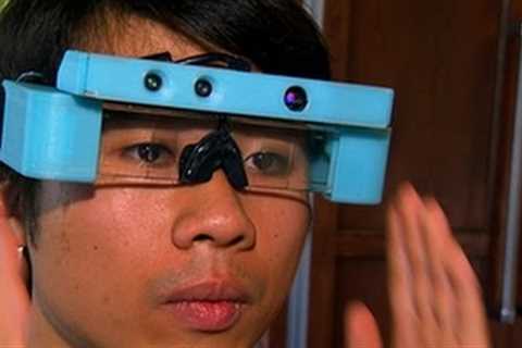 CNET News - Glasses offer 'Minority Report'-style tech