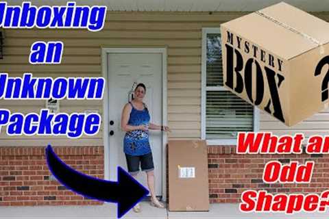 Unboxing an Unknown Mystery package - What is inside? What an odd shape? -Online Reselling