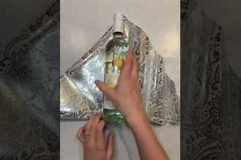 Best way to wrap a wine bottle #wrappingpresents #giftwrapping #wine